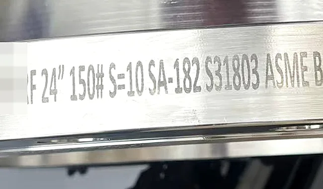 Stamped marking on duplex stainless steel flange: 24 inch 150 lb, SA-182 S31803, ASME B16.5