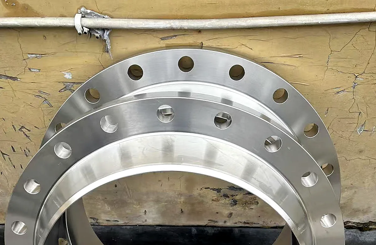 Two duplex stainless steel flanges stacked before shipment
